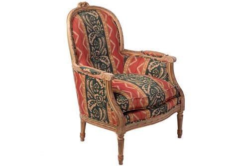 Lot 180 - A Louis XVI style carved and painted bergere...