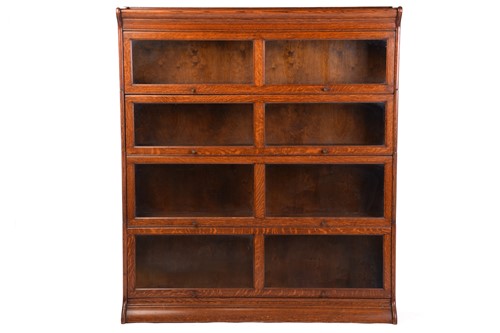 Lot 177 - An oak four-tier Globe Wernicke-style...