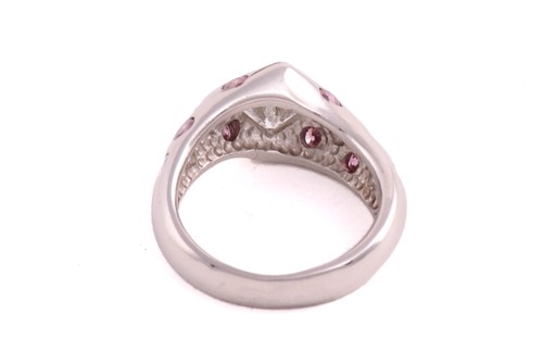 Lot 180 - A single stone princess cut diamond ring in...