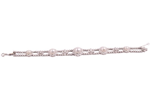 Lot 163 - A Belle Époque pearl and diamond cluster...