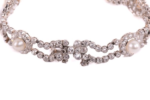 Lot 163 - A Belle Époque pearl and diamond cluster...