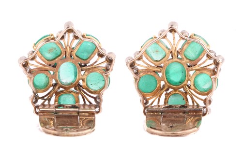 Lot 57 - A pair of emerald and diamond cluster dress...