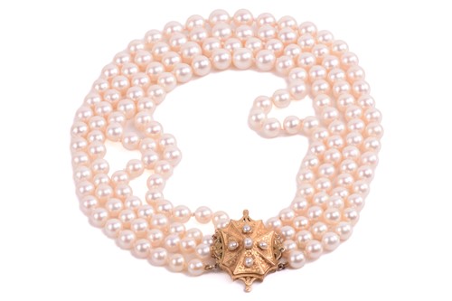 Lot 162 - A four-row cultured pearl necklace, comprising...