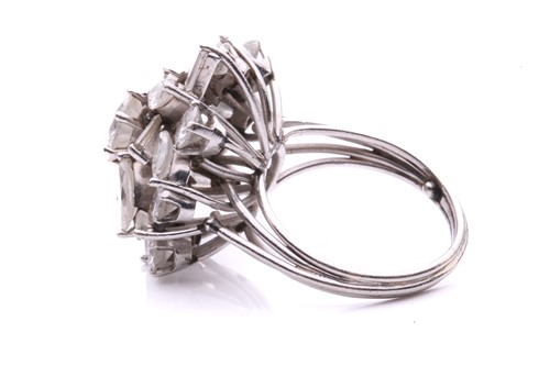 Lot 13 - A diamond spray ring, in the centre of the...
