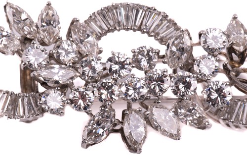 Lot 205 - A botanically inspired swirl diamond cluster...