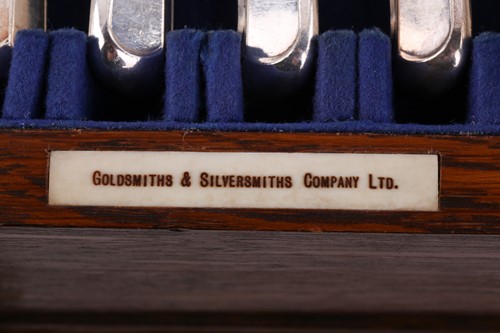 Lot 410 - Goldsmiths & Silversmith Co Ltd - a canteen of...