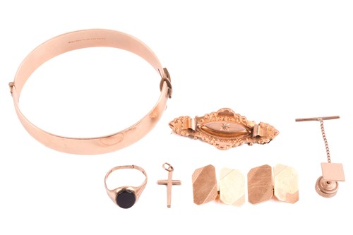 Lot 2 - A pair of 18ct gold cufflinks, the partially...