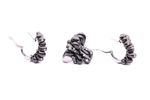 Lot 56 - De Grisogono - a diamond-set bombé ring and...