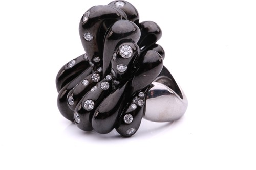 Lot 56 - De Grisogono - a diamond-set bombé ring and...