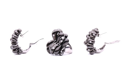 Lot 56 - De Grisogono - a diamond-set bombé ring and...