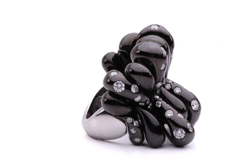 Lot 56 - De Grisogono - a diamond-set bombé ring and...
