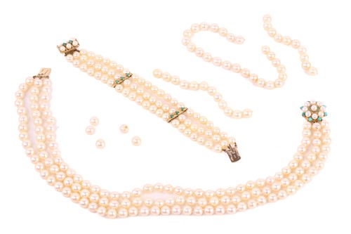 Lot 5 - A three string pearl necklace and bracelet...
