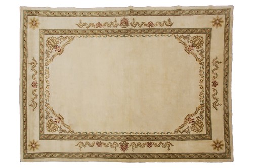 Lot 263 - A large ivory ground Chinese carpet of...
