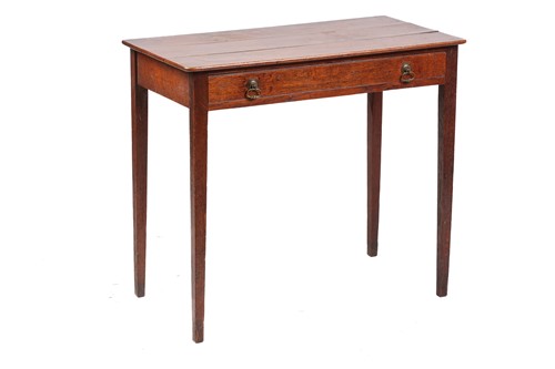 Lot 228 - A George III oak country made single drawer...