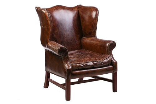 Lot 195 - A George III-style distressed hide upholstered...