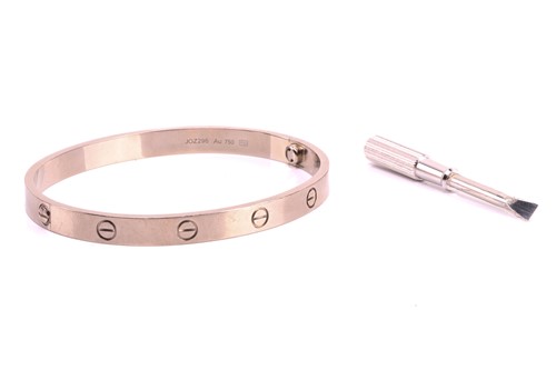 Lot 32 - Cartier - a 'LOVE' bangle in 18ct white gold,...
