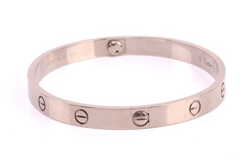 Lot 32 - Cartier - a 'LOVE' bangle in 18ct white gold,...