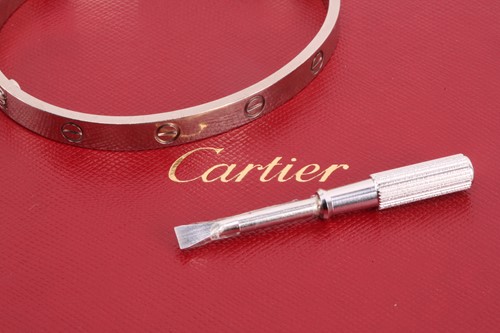 Lot 32 - Cartier - a 'LOVE' bangle in 18ct white gold,...