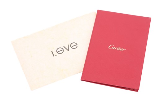 Lot 32 - Cartier - a 'LOVE' bangle in 18ct white gold,...