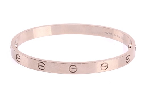 Lot 32 - Cartier - a 'LOVE' bangle in 18ct white gold,...