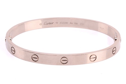 Lot 32 - Cartier - a 'LOVE' bangle in 18ct white gold,...