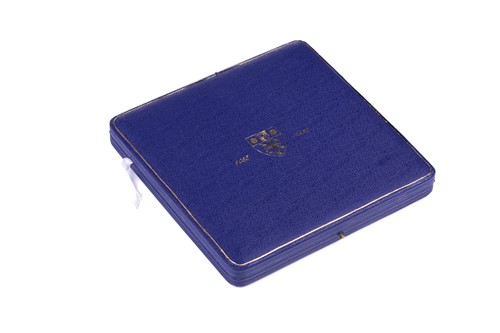 Lot 339 - A Royal Mint commemorative three-medal set:...