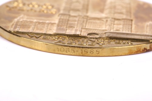 Lot 339 - A Royal Mint commemorative three-medal set:...