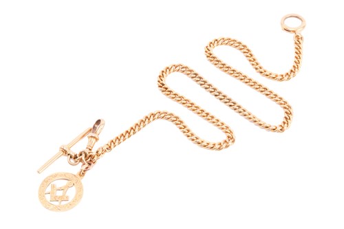 Lot 31 - An 18 carat watch chain and Masonic charm, the...