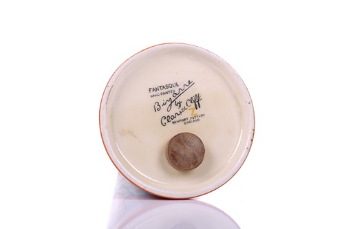 Lot 105 - A 1930s Clarice Cliff conical sugar sifter, in...