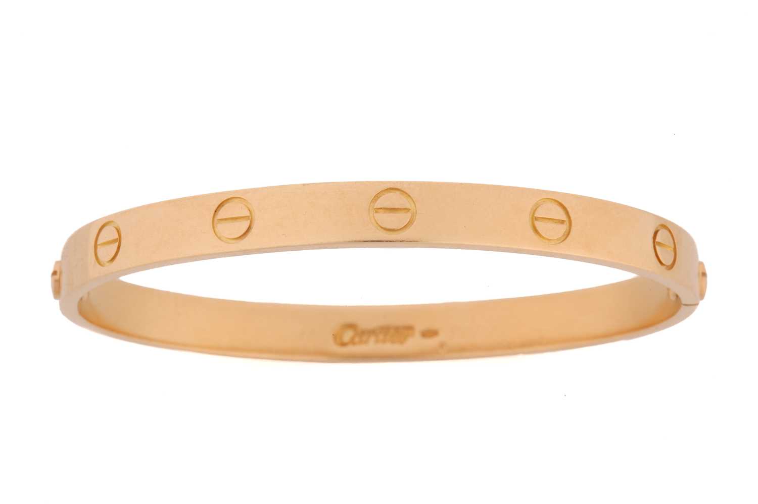 Lot 199 - Cartier - a 'LOVE' bangle, composed of two...