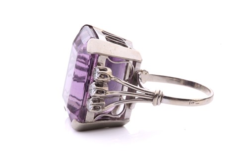 Lot 164 - An amethyst and diamond cocktail ring...