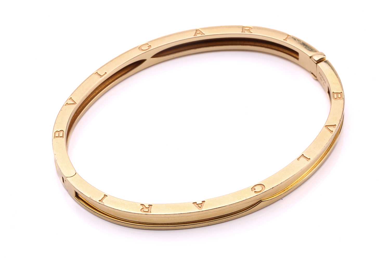 Lot 94 - Bulgari - B.Zero1 hinged bangle, comprising an...