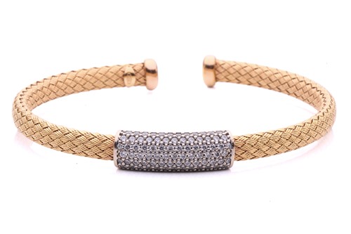 Lot 7 - A wire mesh bangle featuring a central panel...