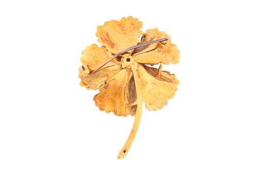 Lot 1 - A sapphire and diamond flower brooch,...