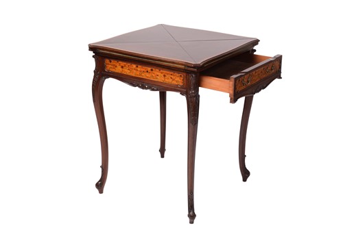 Lot 135 - A late Victorian mahogany envelope card table,...