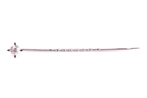 Lot 51 - A diamond tie pin set with an old cut diamond...