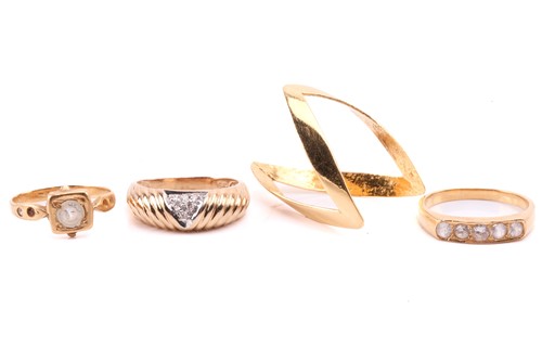 Lot 82 - Four dress rings, to include a diamond-set...