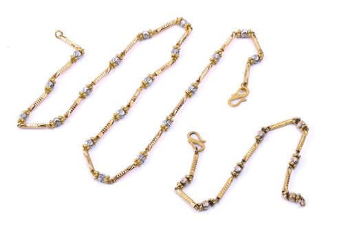 Lot 158 - A three-toned bar link chain necklace and...