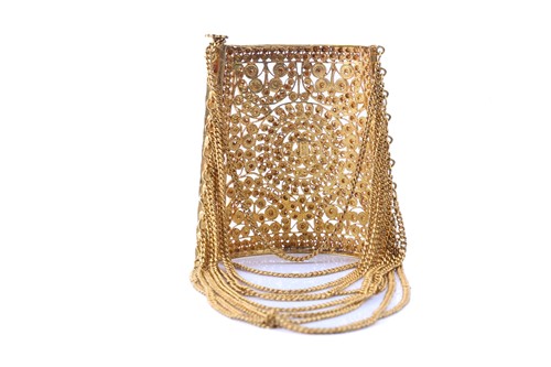 Lot 57 - An Indian cuff bracelet of filigree design,...