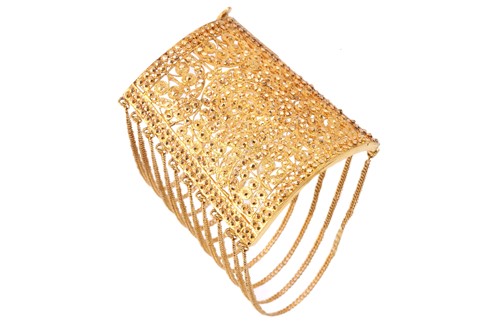 Lot 57 - An Indian cuff bracelet of filigree design,...