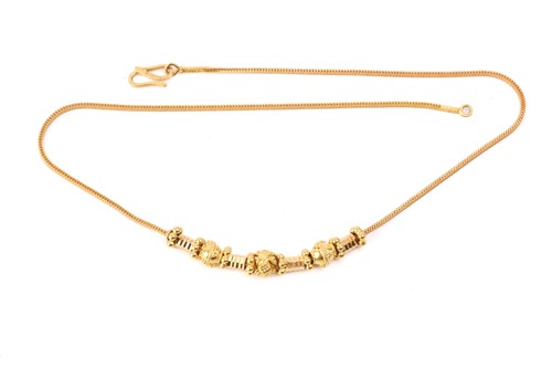 Lot 134 - An Indian beaded necklace, composed of beads...