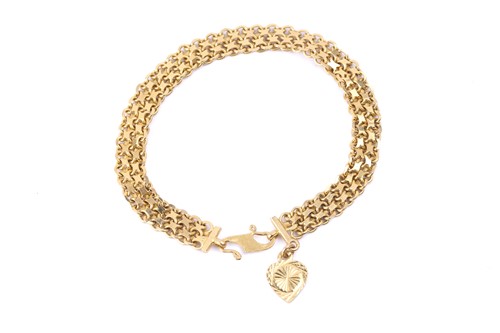 Lot 184 - A bismarck link bracelet, dangling with a...