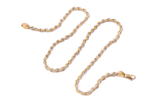 Lot 76 - A two-tone braided necklace, intertwined with...