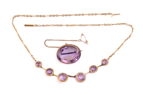 Lot 107 - An amethyst necklace and a matching brooch;...