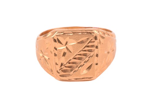 Lot 186 - A signet ring of floral design, the...