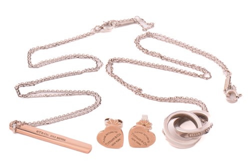 Lot 266 - Tiffany & Co. - two pendants on chain and a...