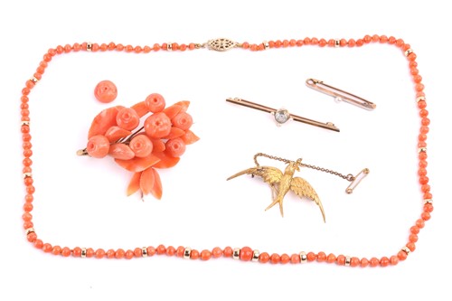 Lot 24 - A small collection of coral jewellery items...