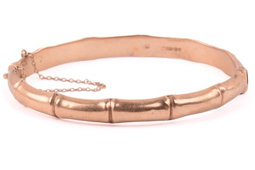 Lot 174 - Two 9ct yellow gold hinged bangles and other...