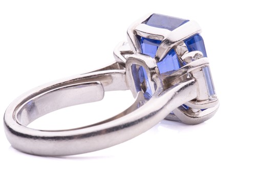 Lot 280 - A sapphire and diamond trilogy ring, featuring...
