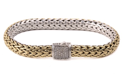 Lot 105 - A reversible bracelet by John Hardy,...